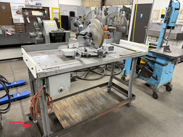 Lot 1-15330 - (1) Ridgid 12", 15 amp laser miter saw, mounted on 60" rolling steel frame table.