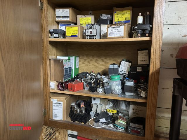 Lot 1-4147 - Cabinet filled with assorted electronics, includes Square-D industrial control transformer, Square-D...
