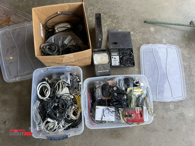 Lot 1-8378 - Large lot of assorted electronics, including various cables, charger wires, WIFI booster, (1) 3-way ...