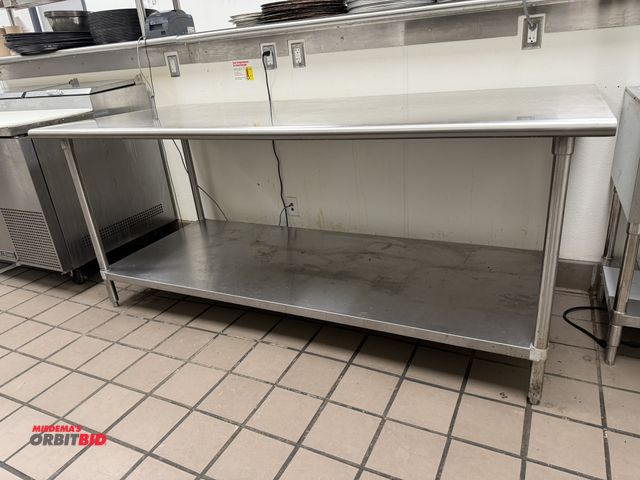Lot 1-11103 - (1) 84" width x 35" height x 36" depth 2-tier stainless steel table.