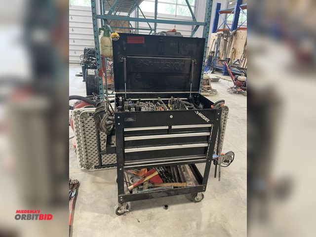 Lot 1-18843 - (1) rolling Husky tool chest on casters, 33" x 20" x approx. 42" tall, ball bearing drawer slides wi...