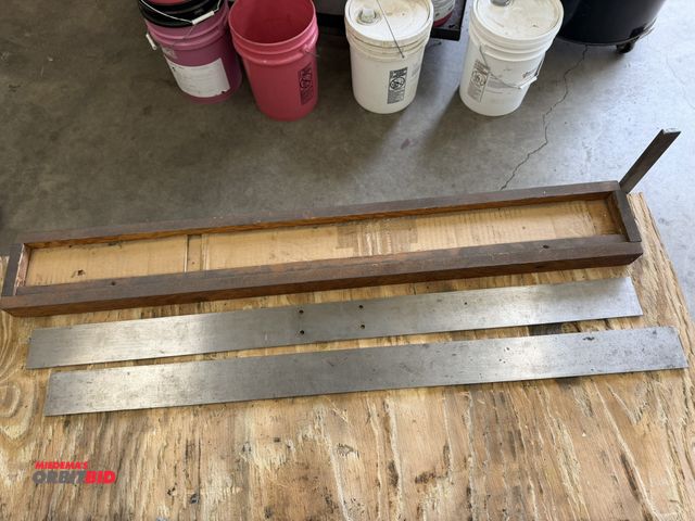 Lot 1-6183 - Set of (2) 36" length x 2.5" width x approx. 1/4" thick straight edges with wood case.