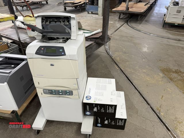 Lot 1-17561 - (1) HP LaserJet 4200 DTNS printer with LaserJet 42/4300 Series accessories, and (2) LaserJet 38A rep...