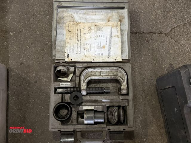 Lot 1-1149 - (1) OTC 3-in-1 brake anchor pin pusher/U-joint press and ball joint removal and installation set, un...