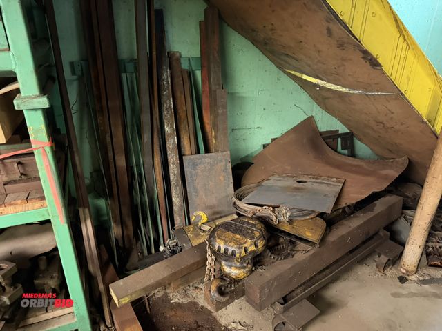 Lot 1-18494 - Lot of assorted tool steel with rack, hoist, assorted steel wire, various size solid tool steel (rus...
