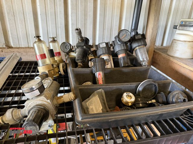 Lot 1-8471 - Large lot of assorted pneumatic cylinders, gauges, Parker brand and more.