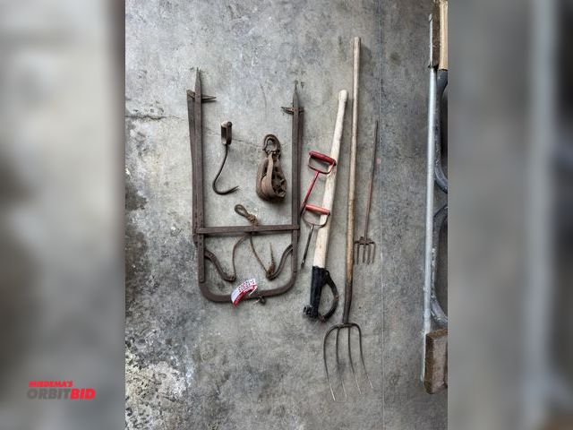 Lot 1-12303 - Lot of assorted hand tools, includes pitch fork, hay hooks, turnbuckle, log turner, and more.