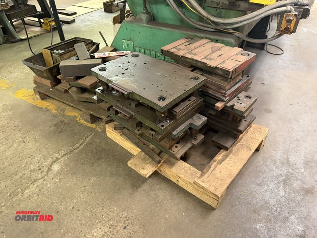 Lot 1-18632 - (2) skids of assorted press dies, steel plates, miscellaneous fasteners, and various other items.