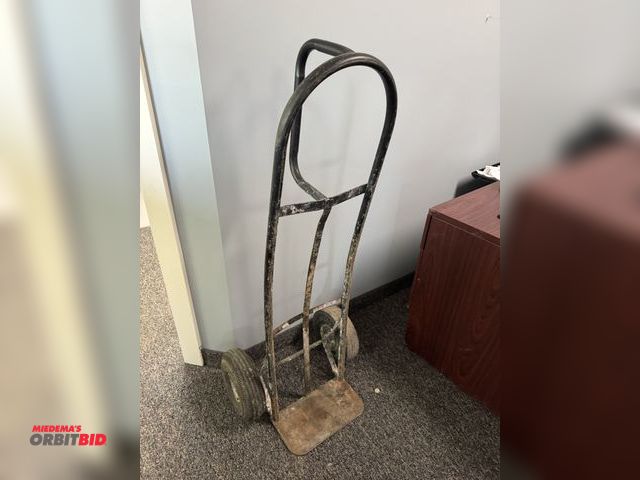 Lot 1-18703 - (1) 2-wheel dolly with pneumatic tires, frame has slight bend, appears to be in working condition.