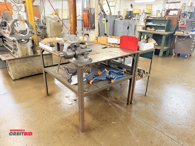 Lot 1-6516 - (1) heavy duty steel shop table, approx. 48" x 41" x 36" tall x approx. 3/4" top, with a Wilton 4" b...