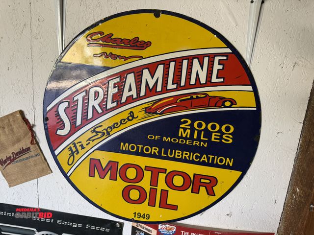 Lot 1-8196 - (1) 30" diameter reproduction, porcelain coated "Streamline Motor Oil" tin sign.