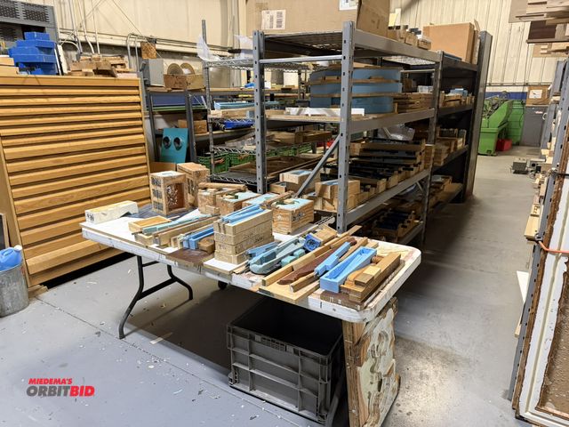 Lot 1-18632 - Contents of (3) racks, includes racks and (1) table of assorted clock making molds, various styles a...