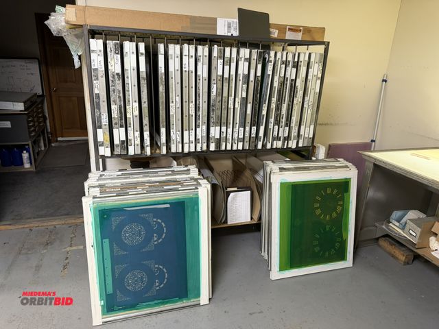 Lot 1-18988 - Large lot of assorted screen printing films for Howard Miller clocks, includes rack, 69" x 28" x 69"...