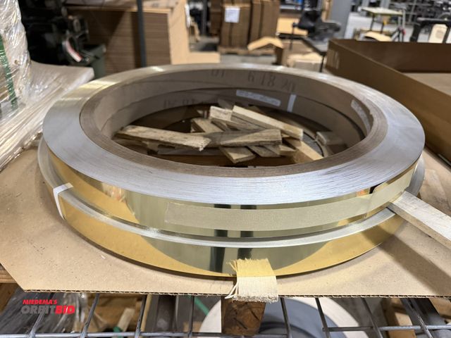 Lot 1-18677 - Lot of (2) coils of 1.5" x .016" anodized aluminum coils.