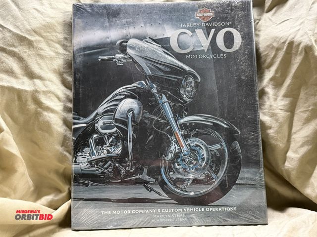 Lot 1-8296 - (1) Harley Davidson CVO Motorcycles coffee table book, unopened and in original plastic.