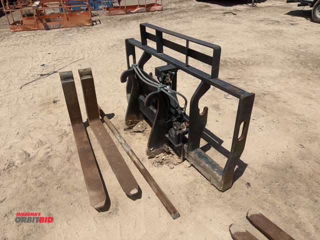 Lot 1-18293 - (1) JLG side tilt fork attachment, overall width 74" with 47" long x 5" wide forks, cylinder pin is ...