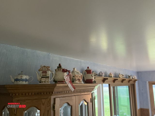 Lot 1-19170 - All tea pots in dining room area on cabinets and shelf, approx. (28)