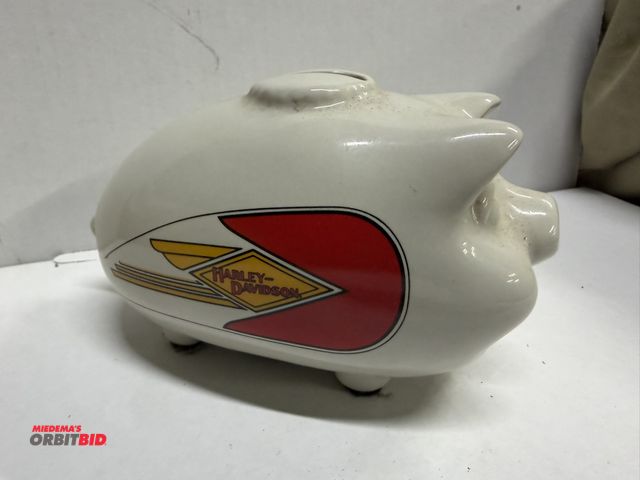 Lot 1-8315 - (1) approx. 6" long x 3.5" tall, collectible, porcelain Harley Davidson hog bank.