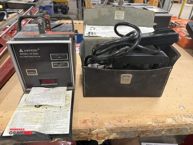 Lot 1-16959 - (1) Amprobe, model PF1000 volt/amp/power factor, and (1) Amptran, model CT50-2, amp clamp meter.