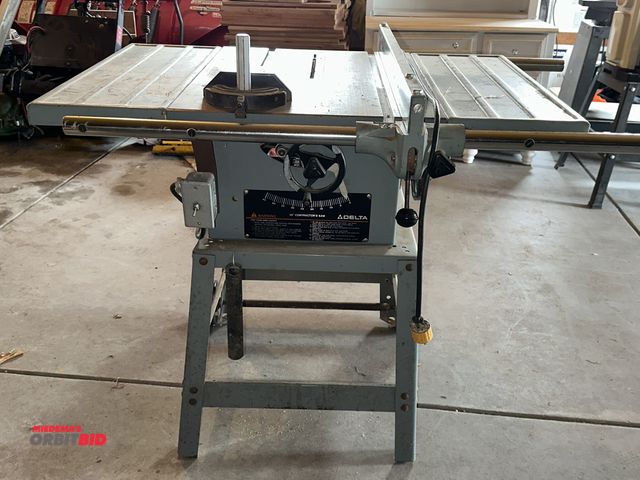 Lot 1-17822 - (1) Delta, model 62-042, 10" table saw, 1 1/2 HP, 115/230V, single phase electric motor, fence, adju...