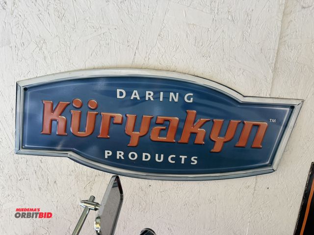 Lot 1-8162 - (1) 29" width x 12" height collectible Kuryakyn tin sign.