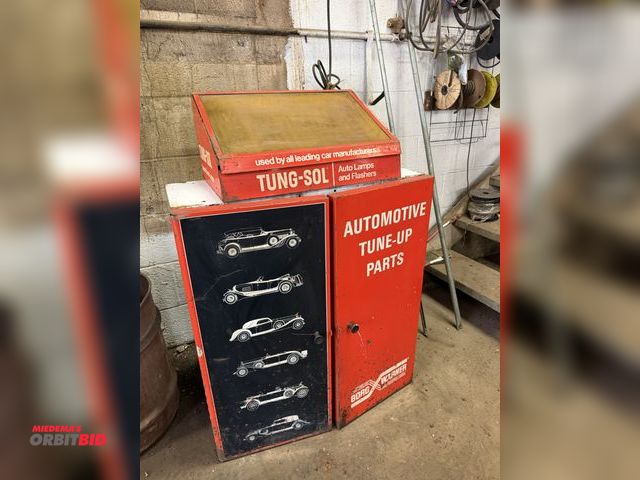 Lot 1-18590 - (1) Borg Warner 2-door vintage parts cabinet, 29" wide x 12" deep x 31.5" tall, with contents of ass...