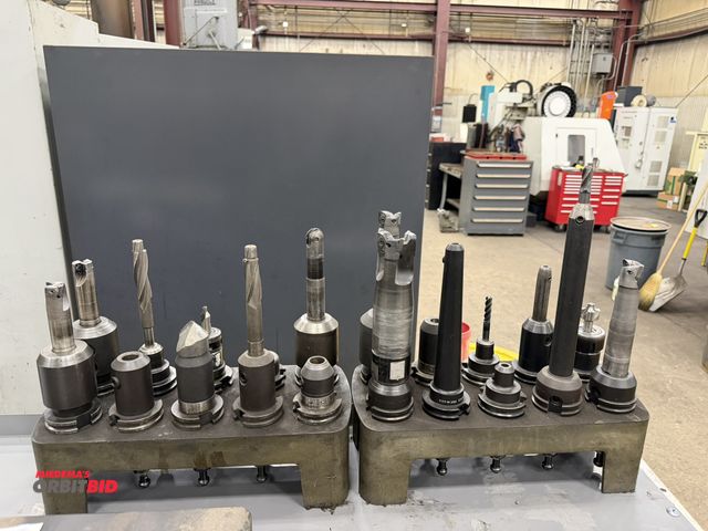 Lot 1-15242 - Lot of (20) assorted Cat 40 tool holders, includes indexable boring bars, shavers, drills, end mills...
