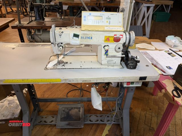 Lot 1-4682 - (1) Juki, DDL5550N-7, commercial sewing machine with Juki CP-130 controls, mounted on power table, w...