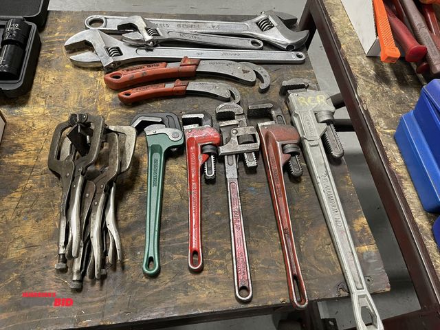 Lot 1-19444 - Large lot of assorted tools, including (2) 24" adjustable wrenches, (1) 24" aluminum Kobalt wrench, ...