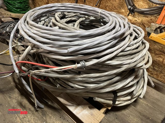 Lot 1-4301 - Large lot of assorted cut pieces of 2/0 AWG aluminum service cable wire.