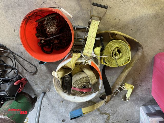 Lot 1-12270 - Lot of assorted 2" ratchet straps, S-chain, cantilevers, 1" straps, bungee cords, and more.