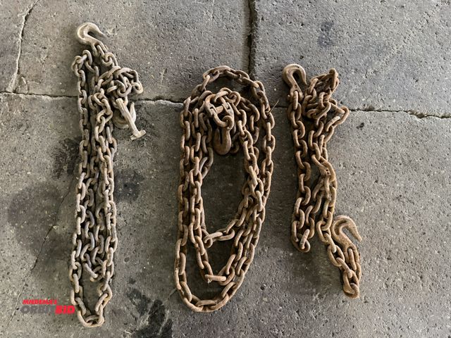 Lot 1-1140 - Lot of (3) various lengths of chain (includes 10', 20', and approx. 8' section of chain).