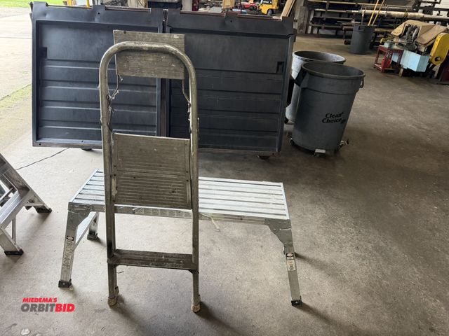 Lot 1-6415 - (1) 39.5" long x 12" deep aluminum pedestal with 19" long legs, and (1) folding 2-step step ladder.