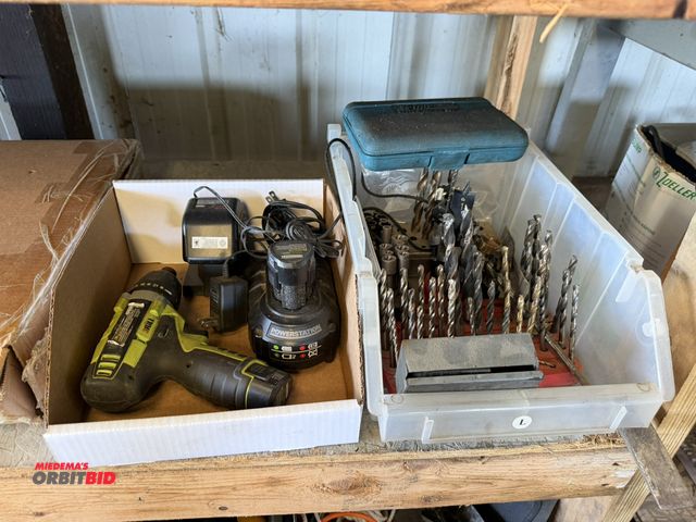Lot 1-8466 - (1) Rockwell 12V cordless drill with (2) batteries, charger, and assorted drill bits, attachments, n...