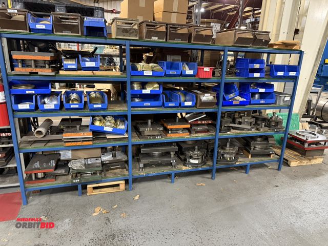 Lot 1-18814 - (1) rack, 12' long x 27" deep x 73" tall with contents of assorted pendulum and hour hand dies, alum...