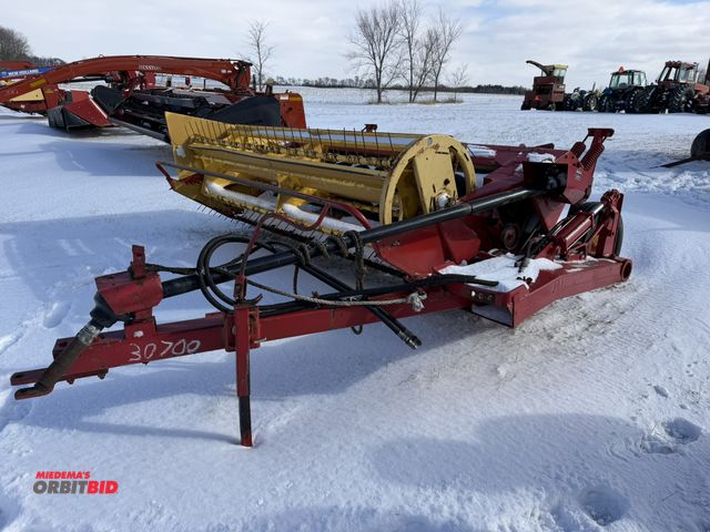 Lot 1-11494 - (1) New Holland 488 haybine, 9' cutting head, rubber roller hay conditioners, S/N 900493.