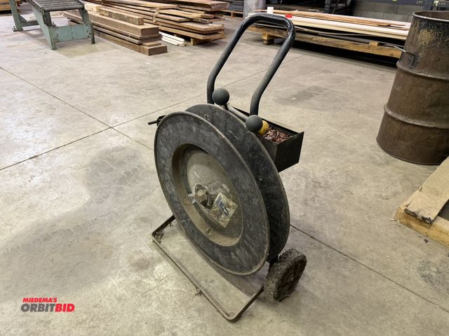 Lot 1-15086 - (1) portable banding dispenser with clips, crimpers, and banding tensioner.