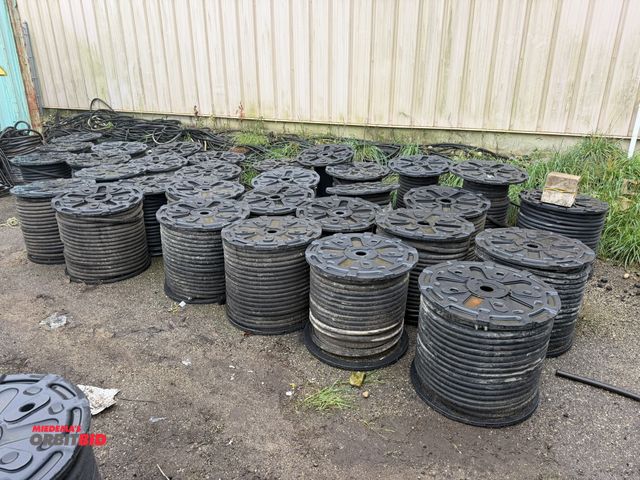 Lot 1-18719 - Lot of (32) full and partial rolls of 1" rubber hose with 1/4" thick inside wall, inside diameter of...