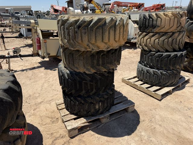 Lot 1-18237 - (4) Outrigger 355/55D625 tires on 9-bolt rim, tires are used