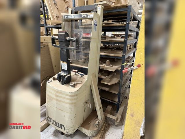 Lot 1-16822 - (1) Crown 2000 lb. capacity, 48V electric, walk behind lift, non-working condition, base of handle i...