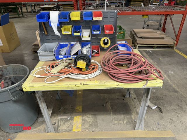 Lot 1-17497 - (1) steel table with contents, 48" x 30", includes Akro rack plate with assorted Akro bins with hard...