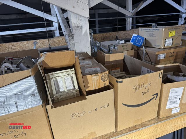 Lot 1-4476 - Large lot of assorted 5000 wiremold, cable tray hangers, 4" remodel cans, and more.