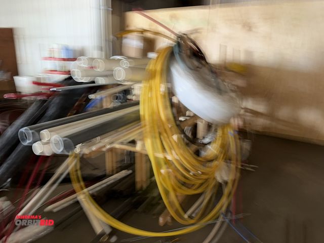 Lot 1-13186 - Large lot of assorted PVC plumbing pipe, and assorted black pipe, 3", 2", 1.5", various PEX, and muc...