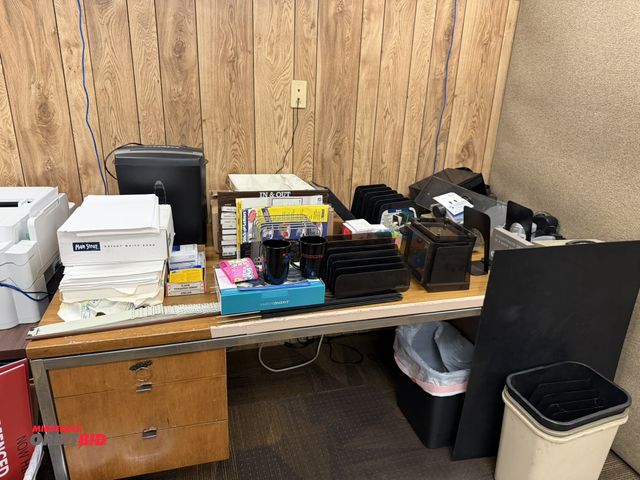 Lot 1-15506 - (1) 80" wooden desk with contents, includes paper shredder, paper organizers, Rolodex cards, coffee ...