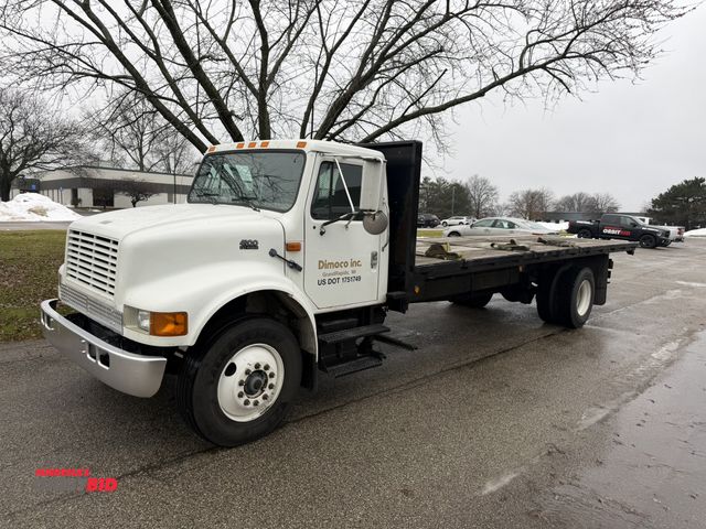 Lot 1-15404 - 1999 International 4900 Flatbed Truck single axle, day cab, International DT466 diesel engine, 7-spe...
