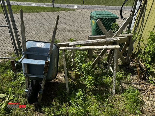 Lot 1-14267 - Lot of (1) Jackson heavy duty Pro Grade wheelbarrow, and (3) assorted saw horses.