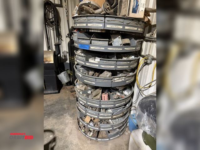 Lot 1-1552 - (1) approx. 32" diameter x 66" tall free standing, 8-level rotating hardware storage unit with assor...