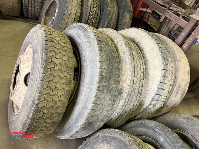 Lot 1-18184 - Lot of (5) various size 275/70R 22.5 tires with 10-lug rims.
