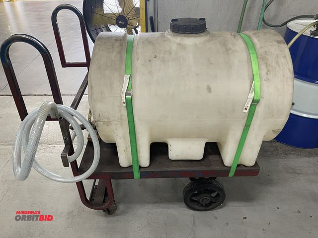 Lot 1-19365 - (1) approx. 60 gallon Romotech poly tank, mounted on steel cart, bottom discharge valve.