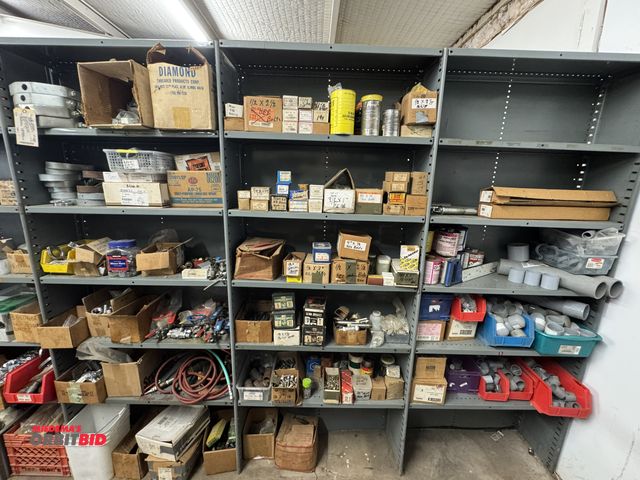 Lot 1-6428 - Contents of 3 shelving units, includes assorted valves, nipples, pipe hangers, 1" copper clamps, (8)...